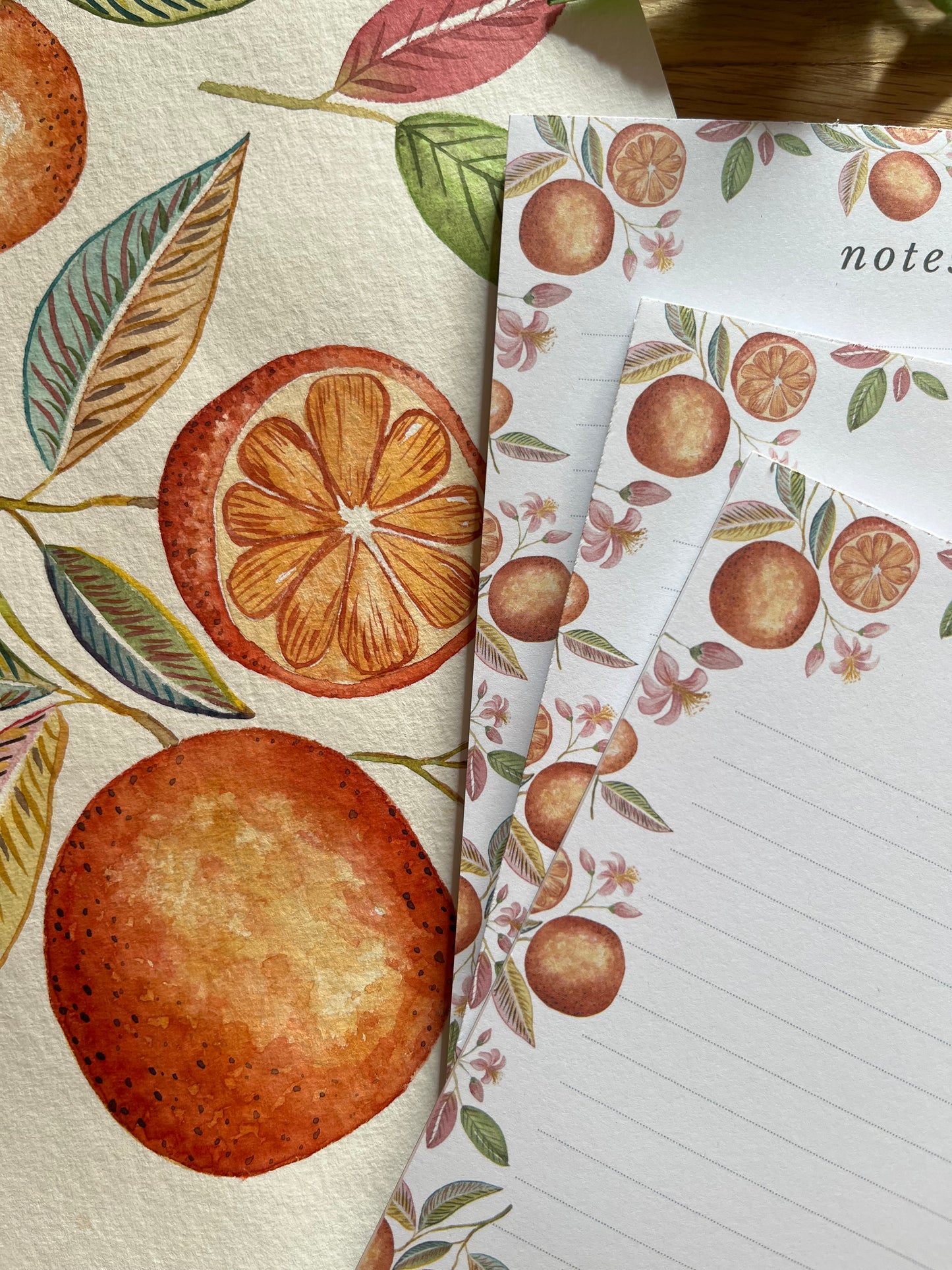 Notebook with orange and leaf pattern on cover and pages